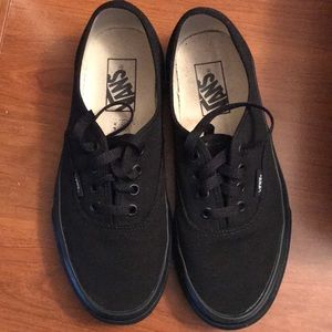 Vans- black. Womens 7.5 / men’s 6